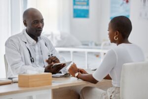 Doctor consulting, talking and health check service of a woman at a hospital or clinic. Working med